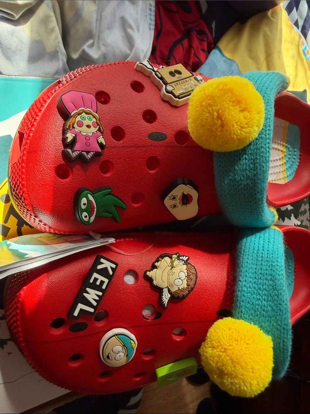 CROCS Kids Red Clog with Brown Sole and Teal Strap Accents